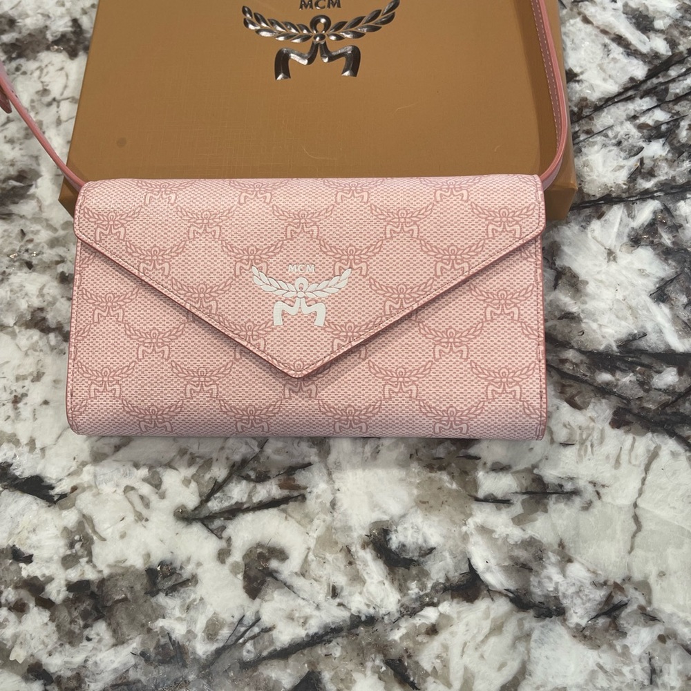 MCM Light Pink Clutch with Logo Pattern